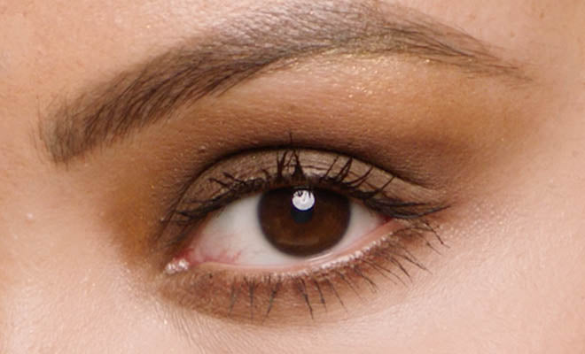 Macro shot of model wearing Shadowstix Longwear Eyeshadow Sticks collection and Hella Thicc Mascara.